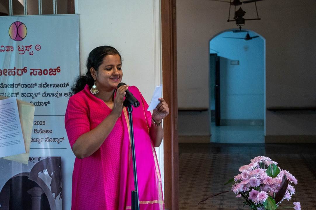 A person in a pink dress holding a microphone

AI-generated content may be incorrect.